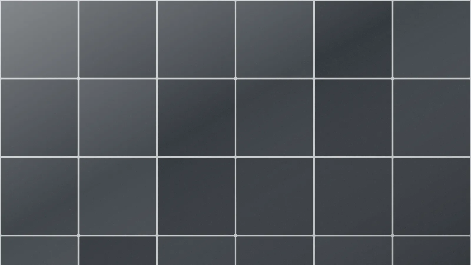 Large graphite floor tiles with light grout lines