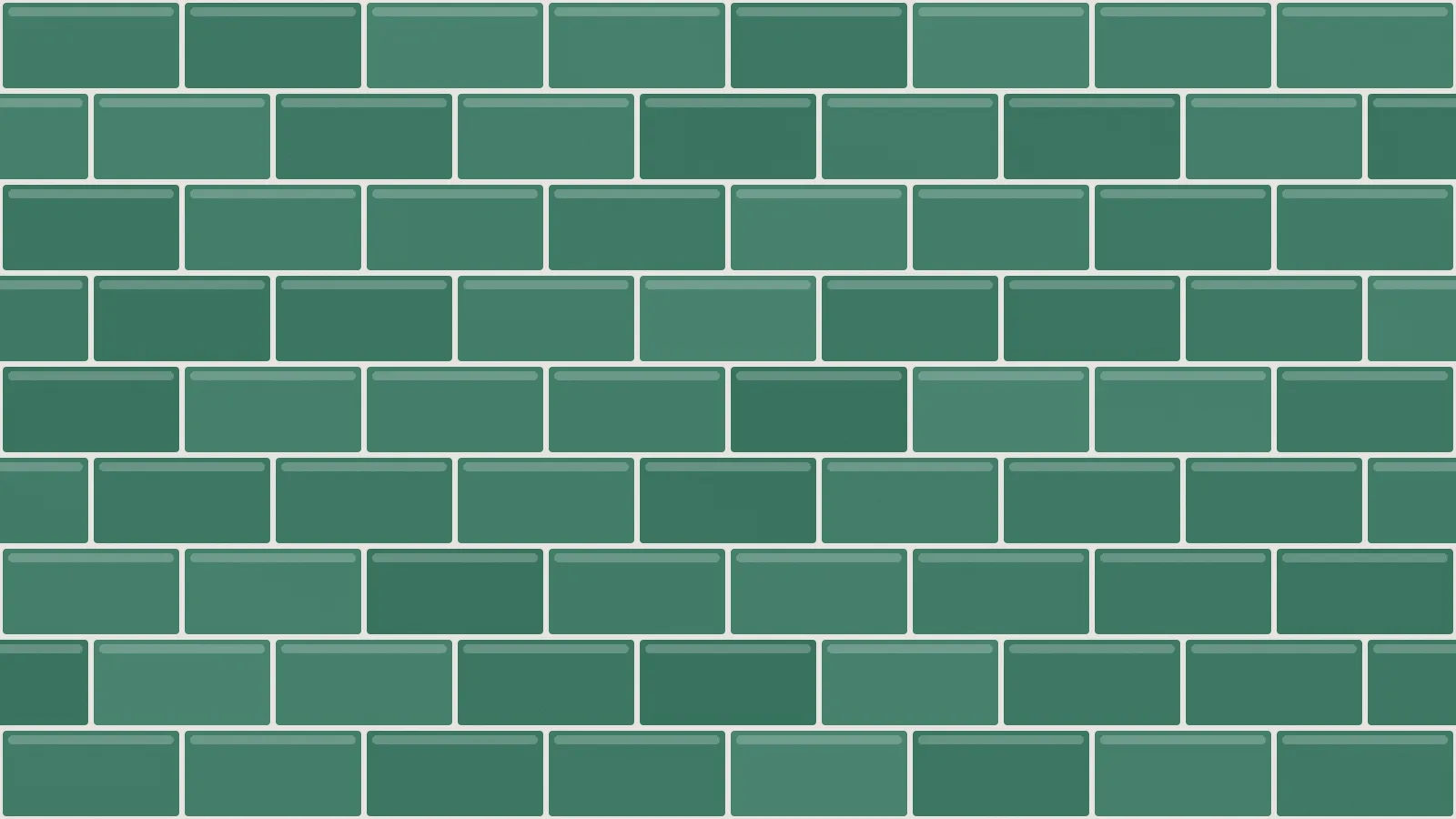 Glossy green wall tiles laid in a brick bond