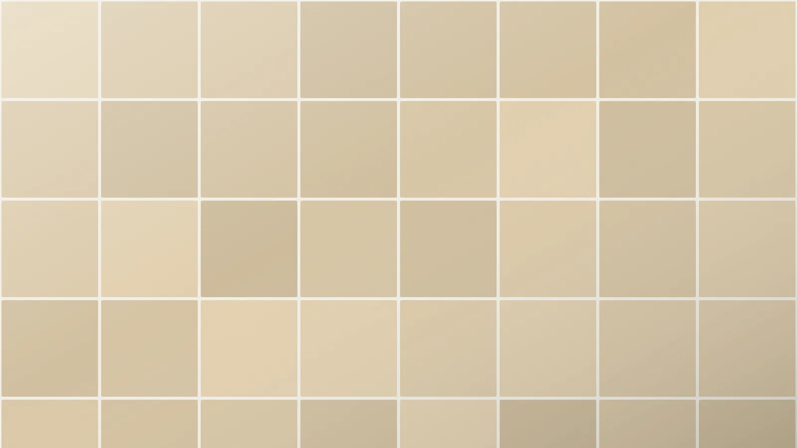 Sand-coloured square tiles with slight tonal variation