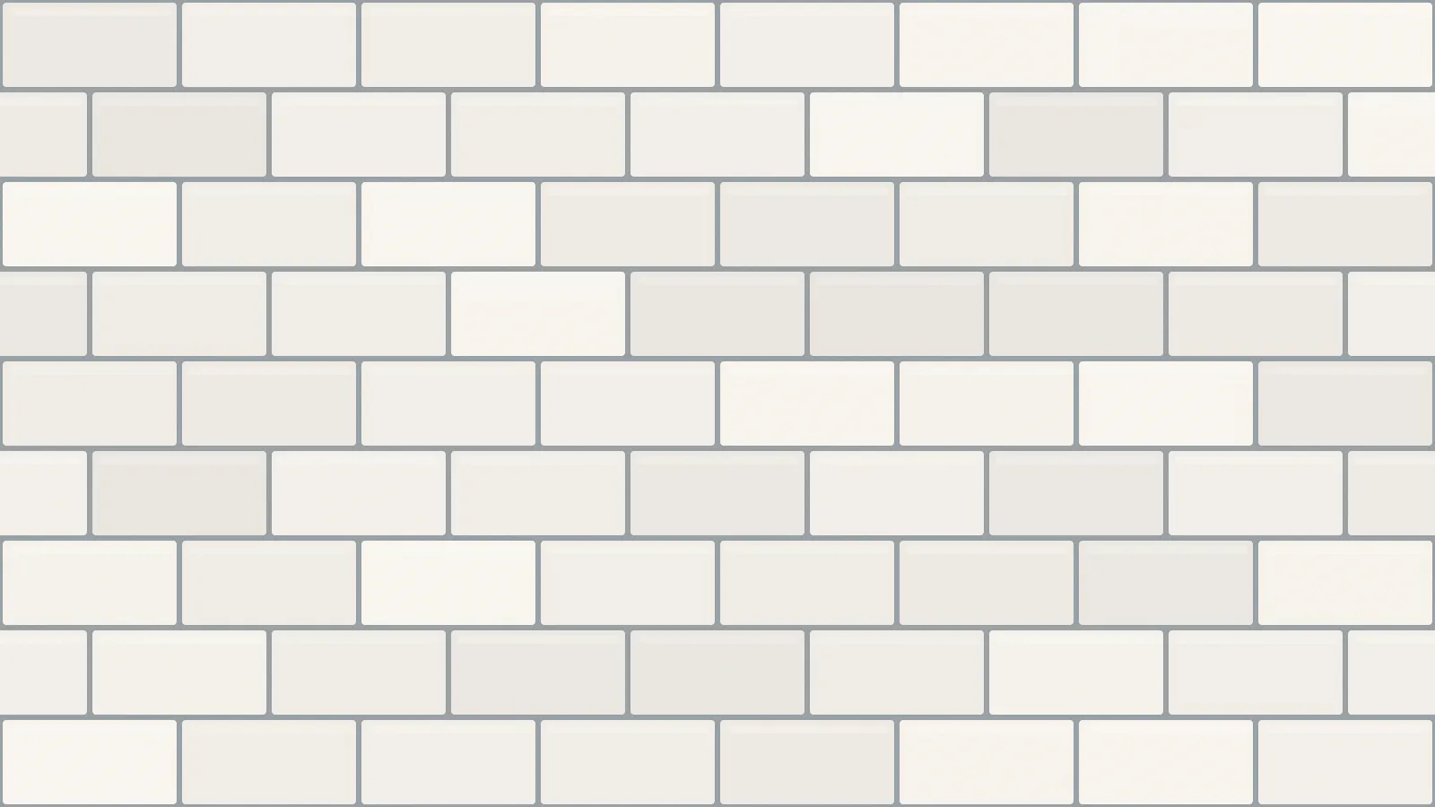 White rectangular wall tiles laid in a brick bond