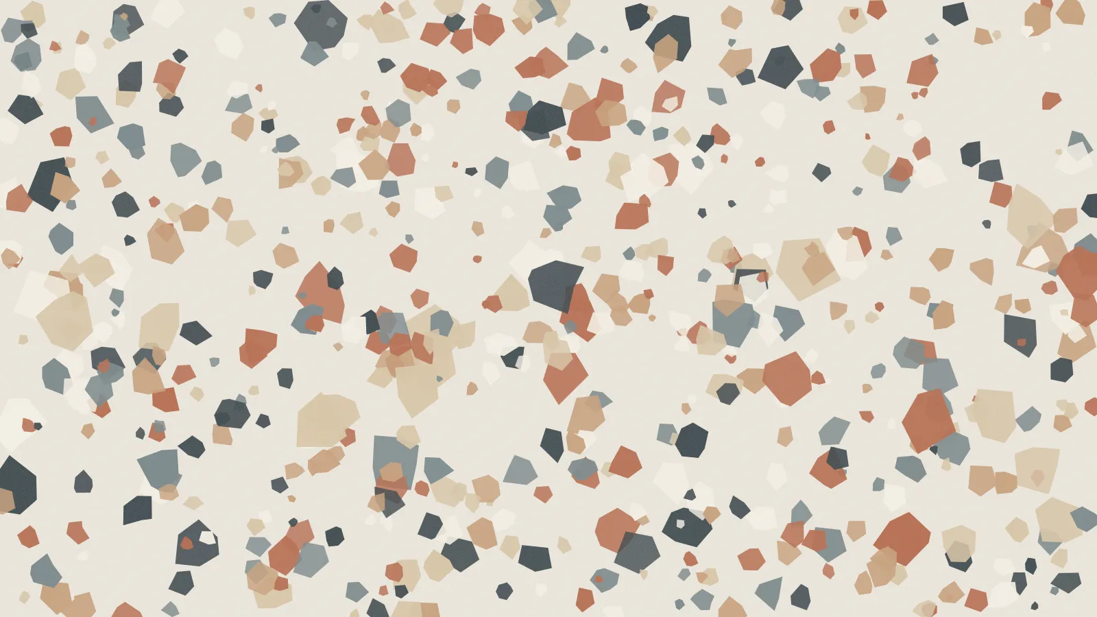 A terrazzo surface with warm and grey stone chips